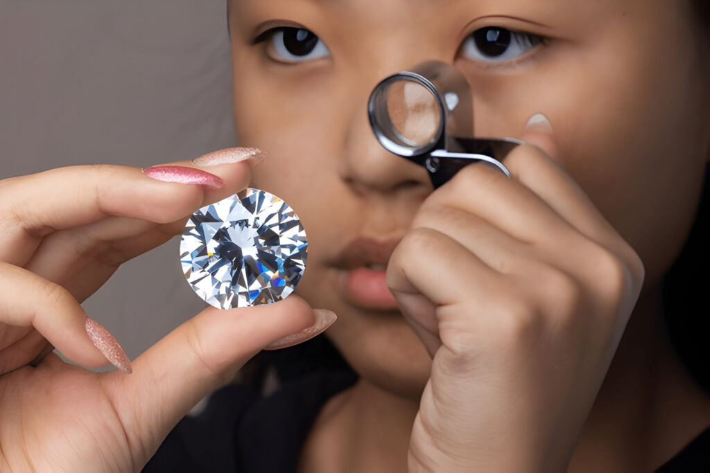 Round cut huge diamond in the hand of an Asian