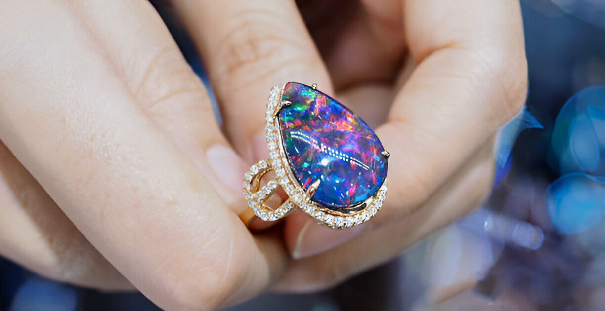 Black Fire Opal Ring in Hands