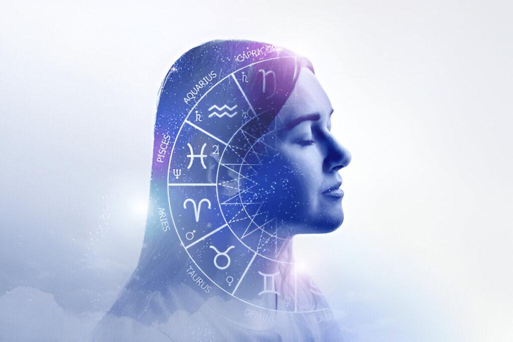 young girl in profile with the zodiac circle and signs of the zodiac